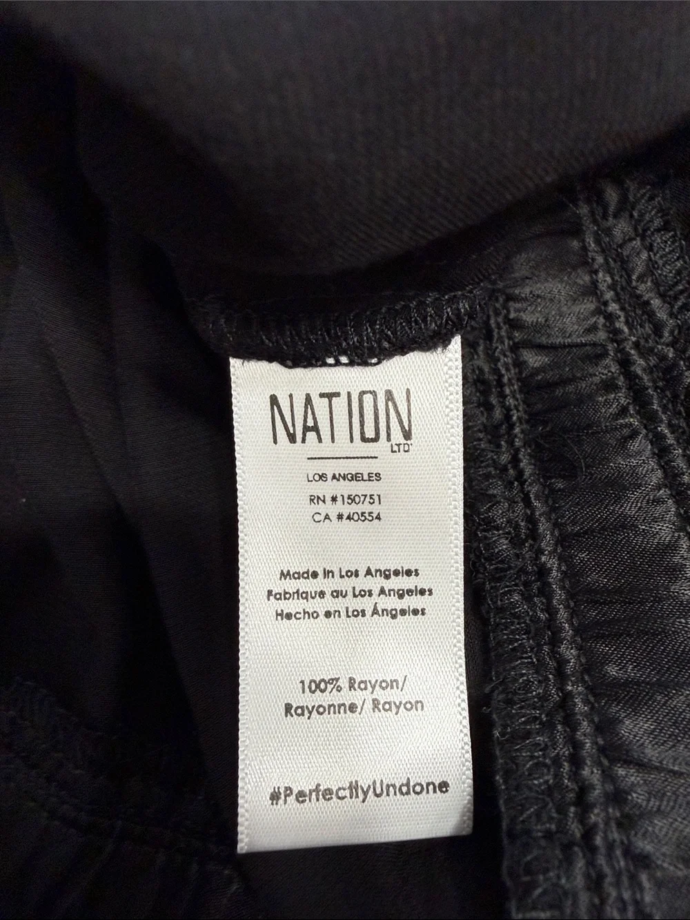 NWOT Nation LTD Black One-Shoulder Satin Peplum Top